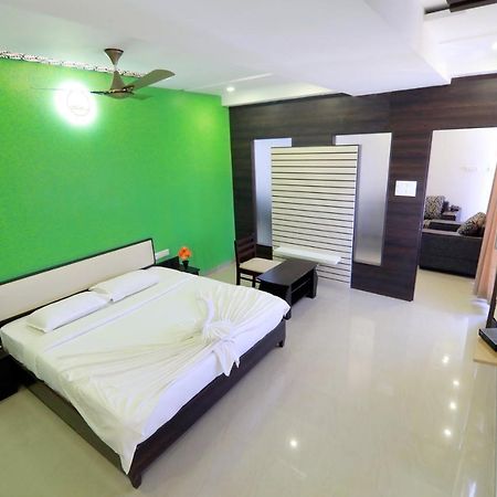 Hotel Ambai Grand Ambāsamudram Extérieur photo