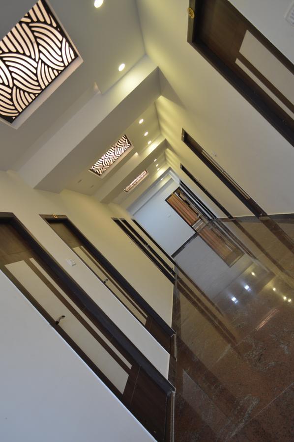 Hotel Ambai Grand Ambāsamudram Extérieur photo