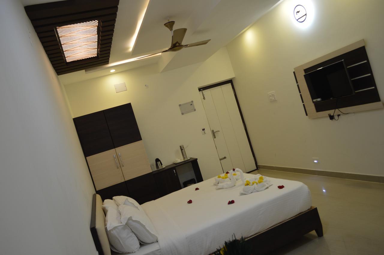 Hotel Ambai Grand Ambāsamudram Extérieur photo