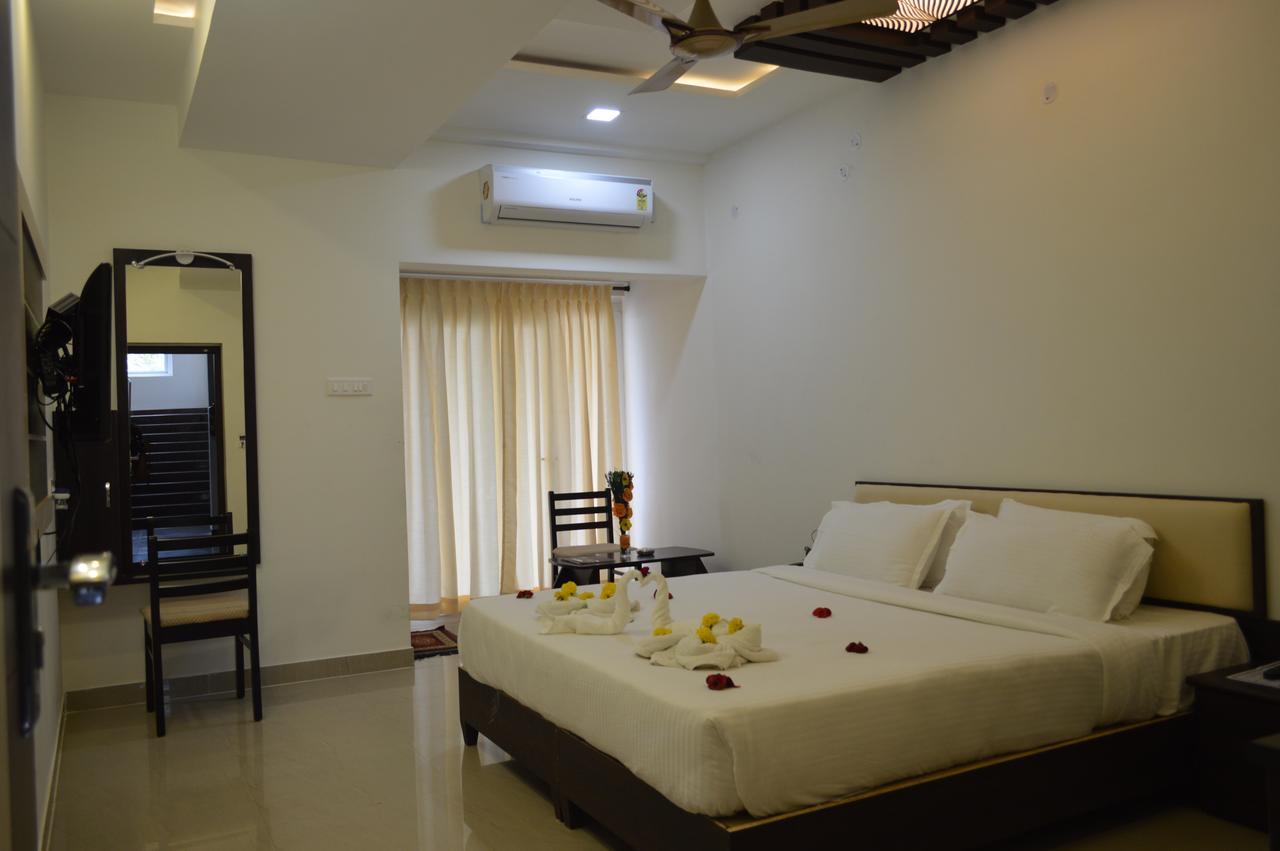 Hotel Ambai Grand Ambāsamudram Extérieur photo
