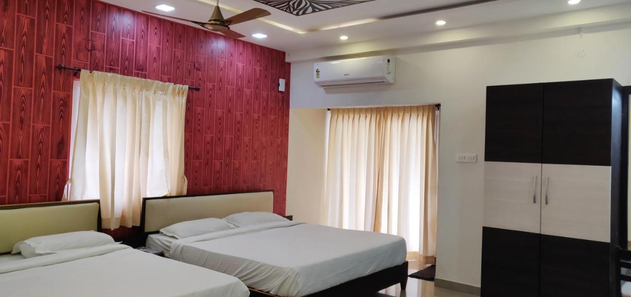 Hotel Ambai Grand Ambāsamudram Extérieur photo