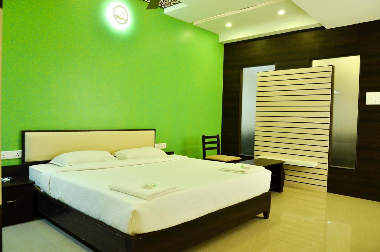 Hotel Ambai Grand Ambāsamudram Extérieur photo