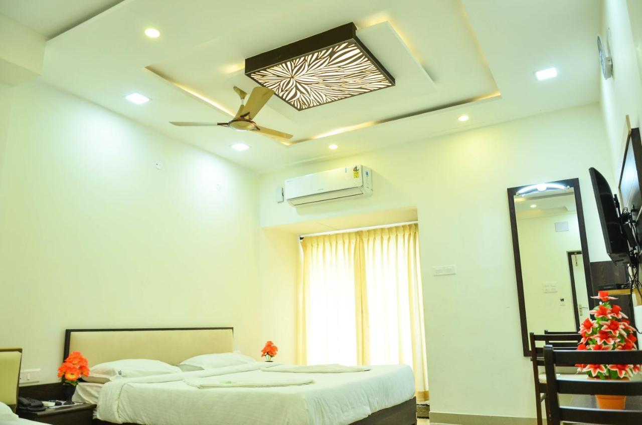 Hotel Ambai Grand Ambāsamudram Extérieur photo