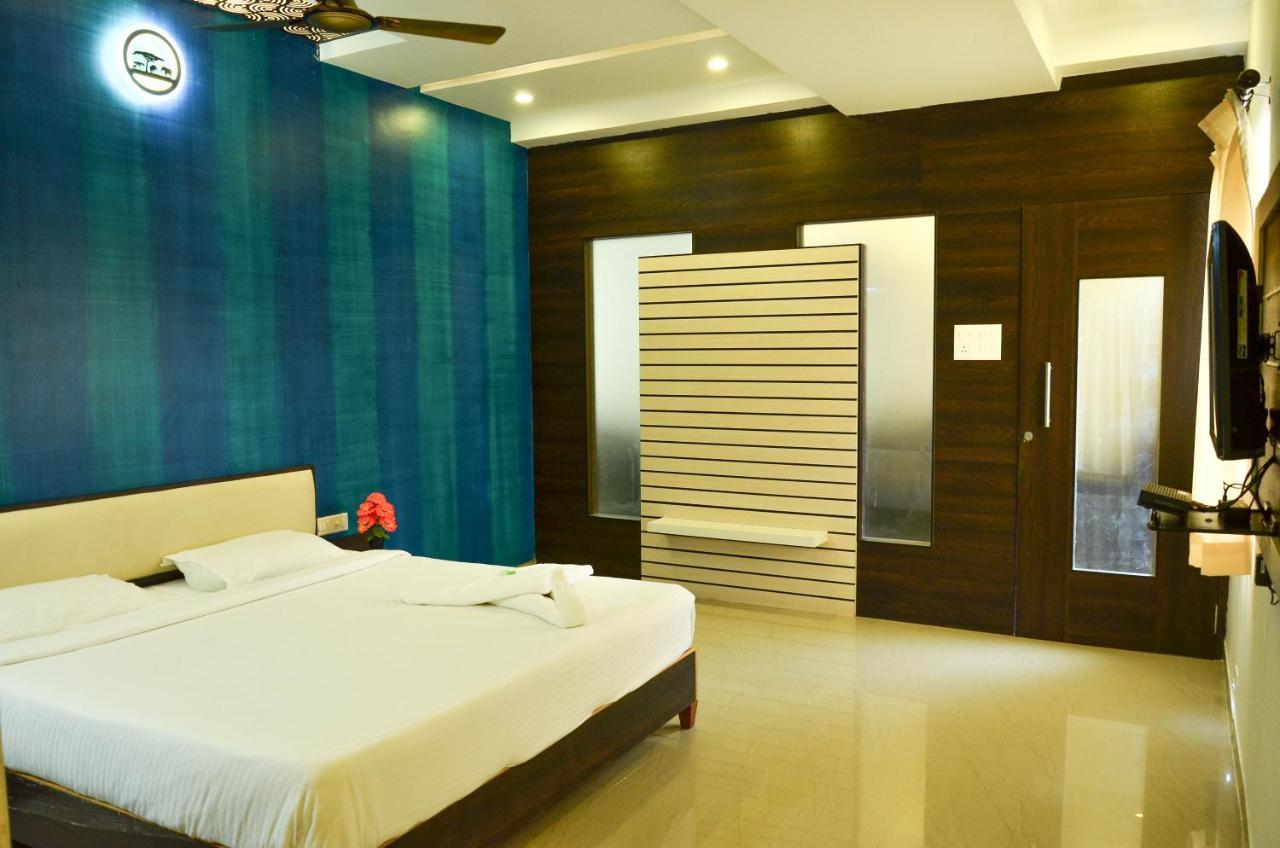 Hotel Ambai Grand Ambāsamudram Extérieur photo