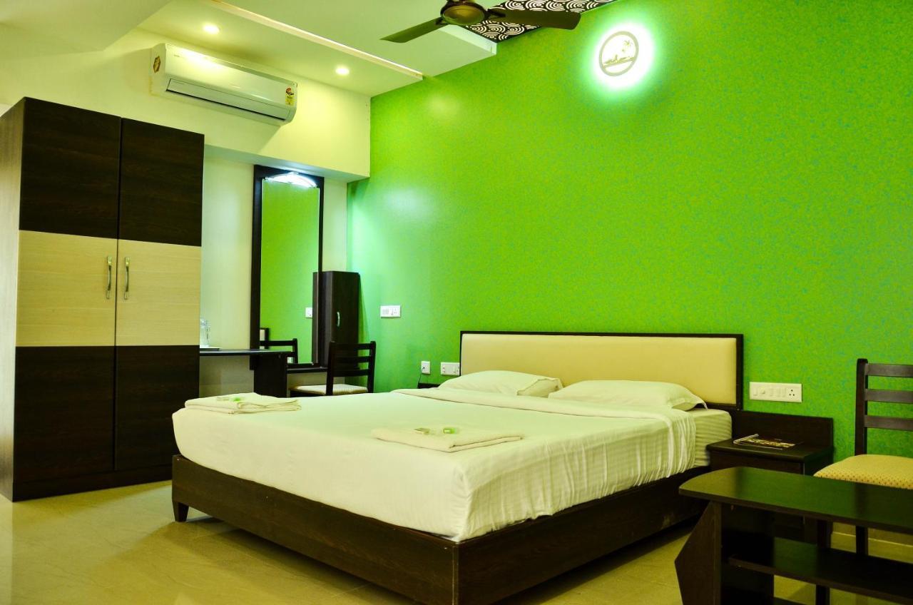 Hotel Ambai Grand Ambāsamudram Extérieur photo