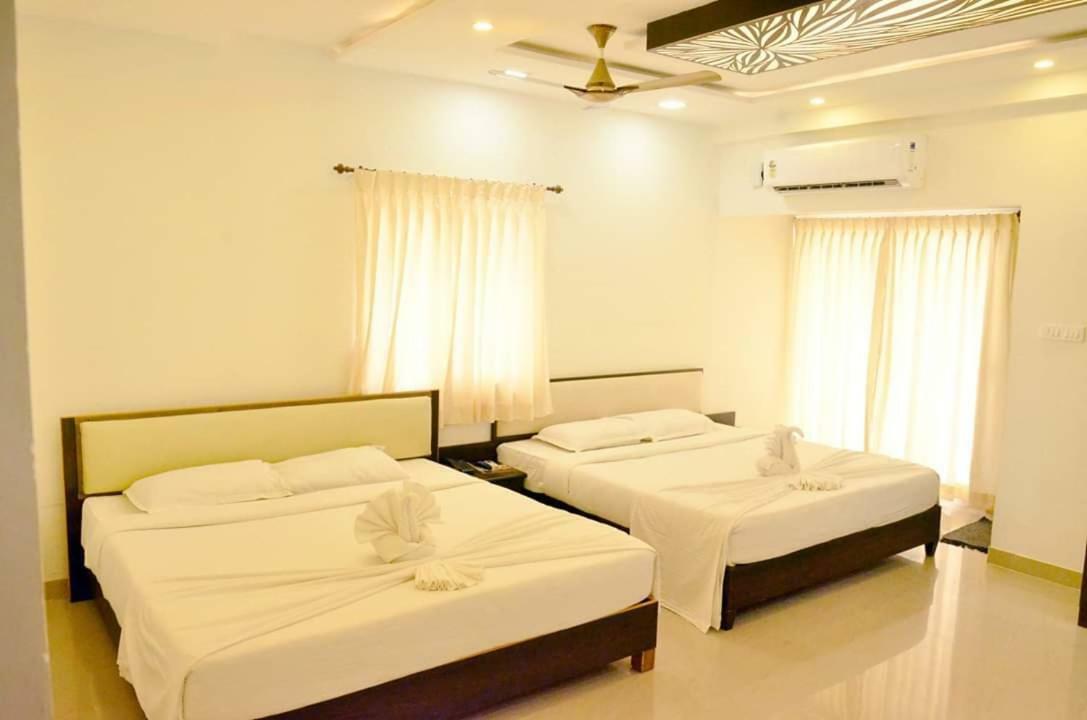 Hotel Ambai Grand Ambāsamudram Extérieur photo