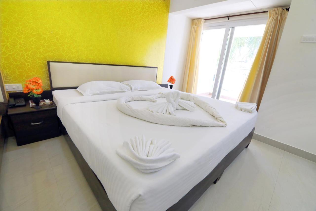 Hotel Ambai Grand Ambāsamudram Extérieur photo