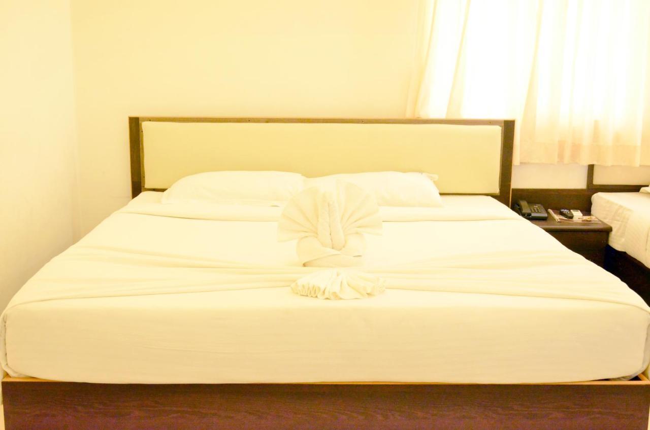 Hotel Ambai Grand Ambāsamudram Extérieur photo
