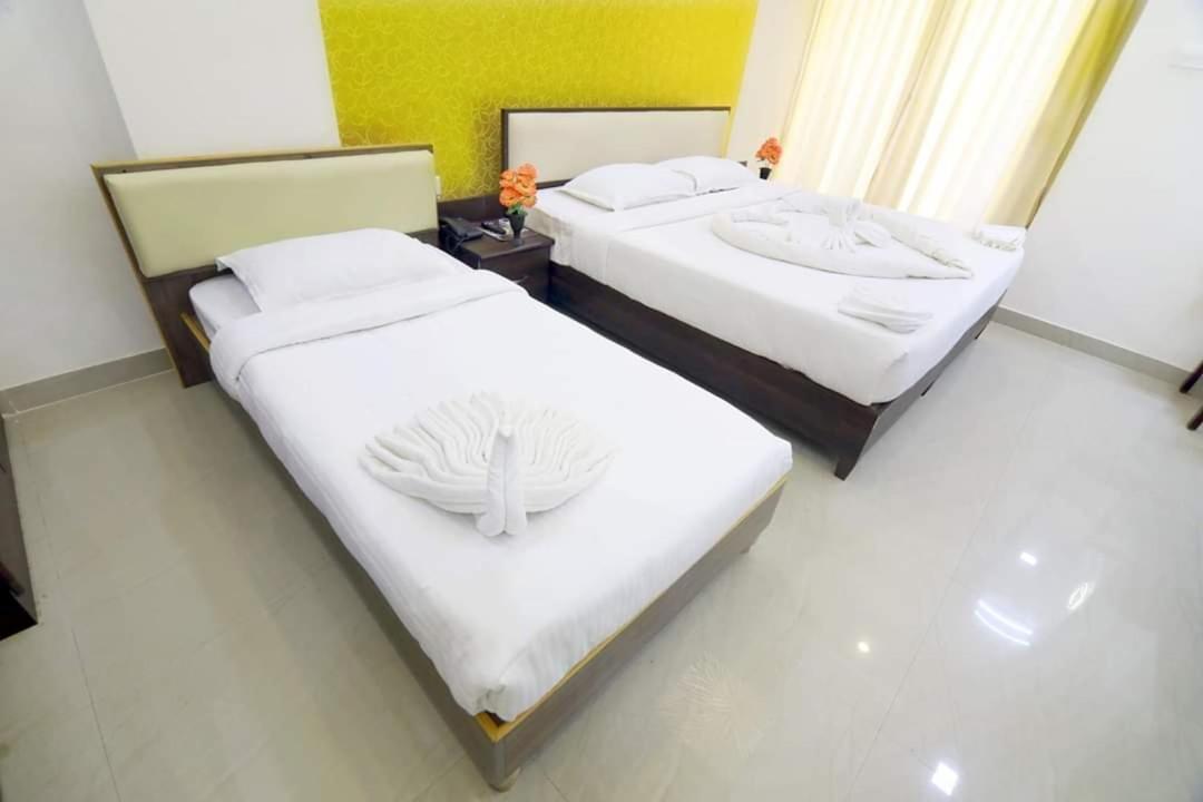 Hotel Ambai Grand Ambāsamudram Extérieur photo
