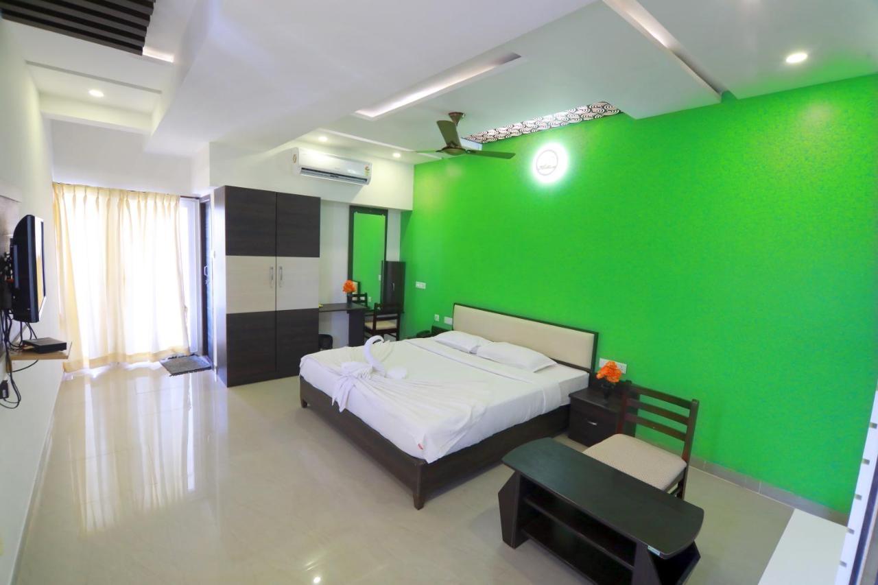 Hotel Ambai Grand Ambāsamudram Extérieur photo