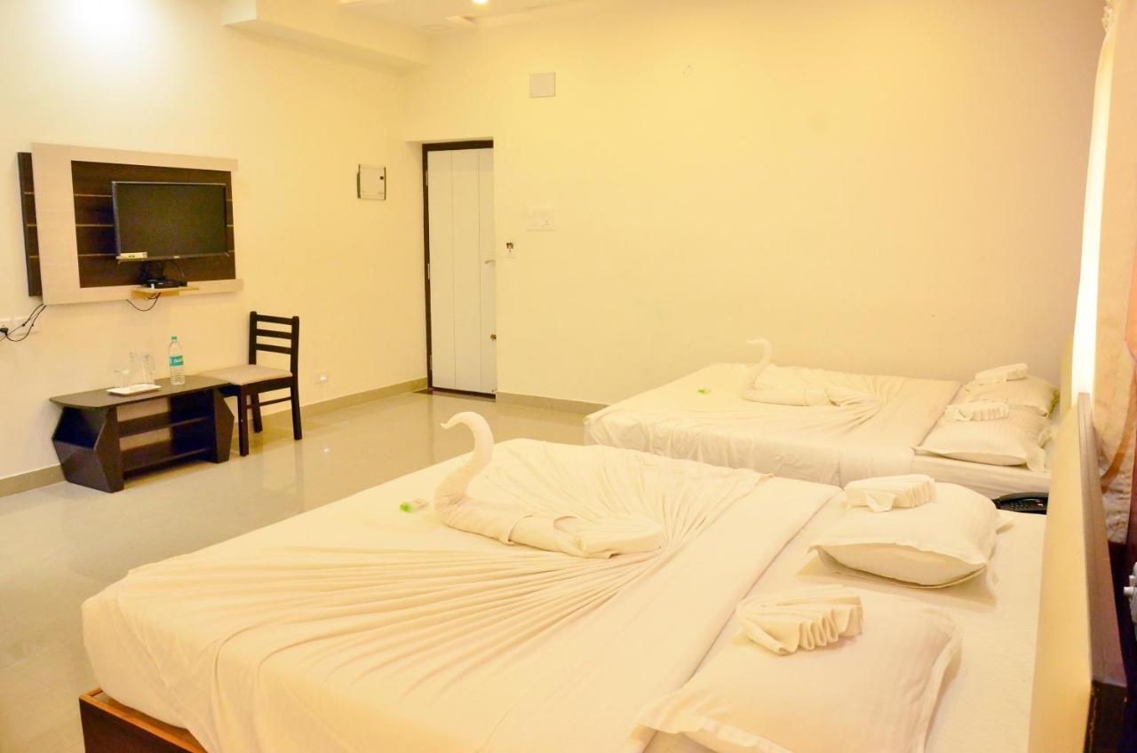 Hotel Ambai Grand Ambāsamudram Extérieur photo