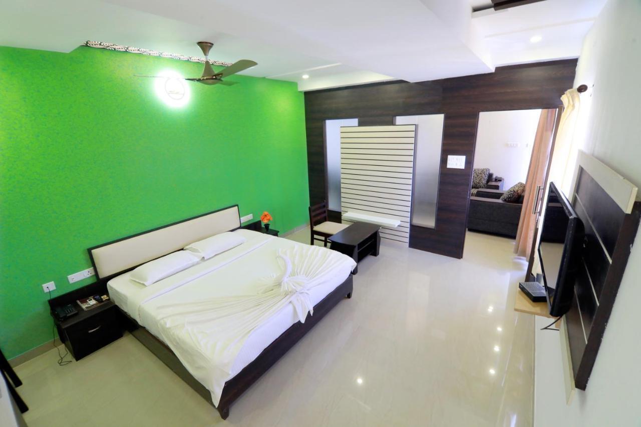 Hotel Ambai Grand Ambāsamudram Extérieur photo