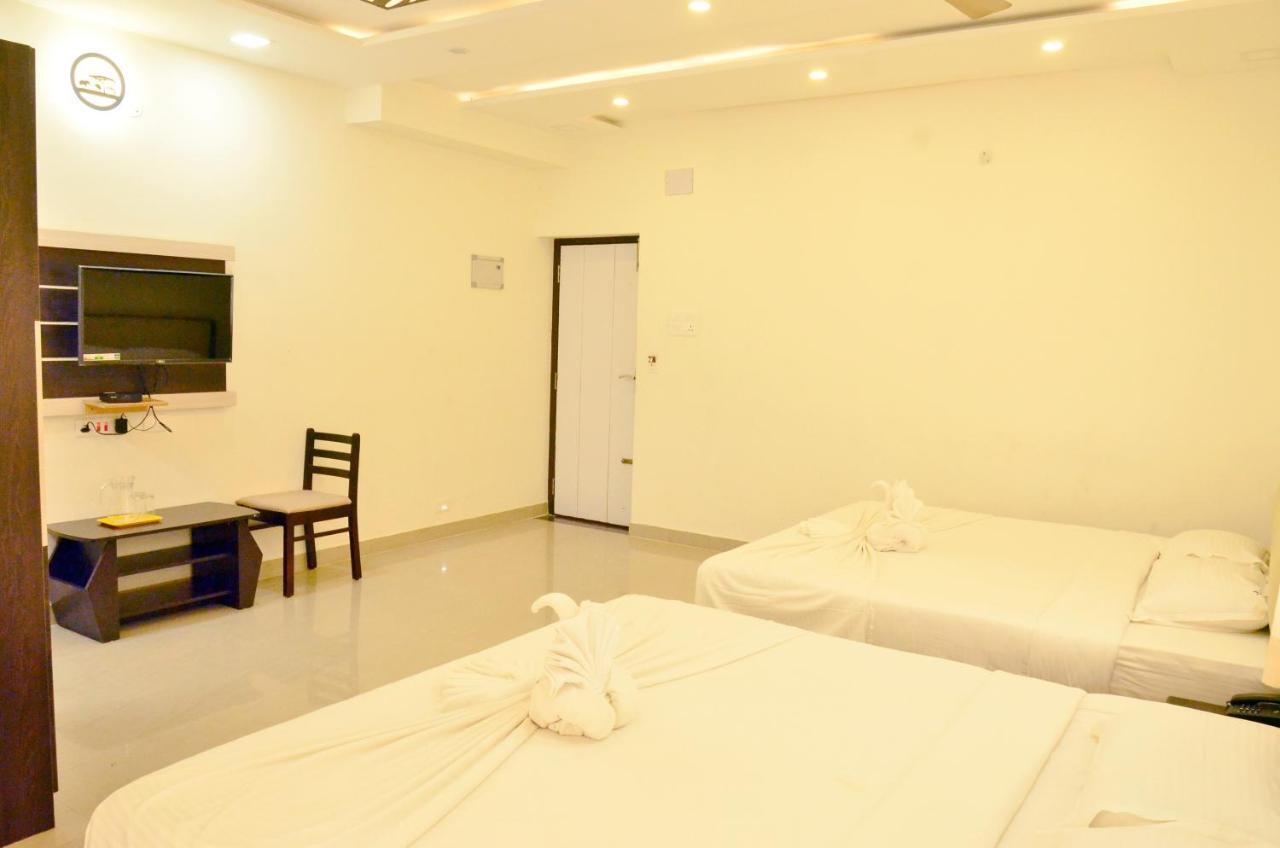 Hotel Ambai Grand Ambāsamudram Extérieur photo